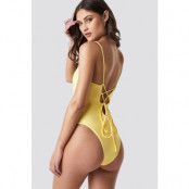 Camille Botten x NA-KD Lacing Open Back Swimsuit - Yellow