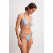 NA-KD Swimwear Bikinitrosa med hög skärning och knytning - Blue,Flower