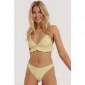NA-KD Swimwear Högt skuren bikinitrosa - Yellow